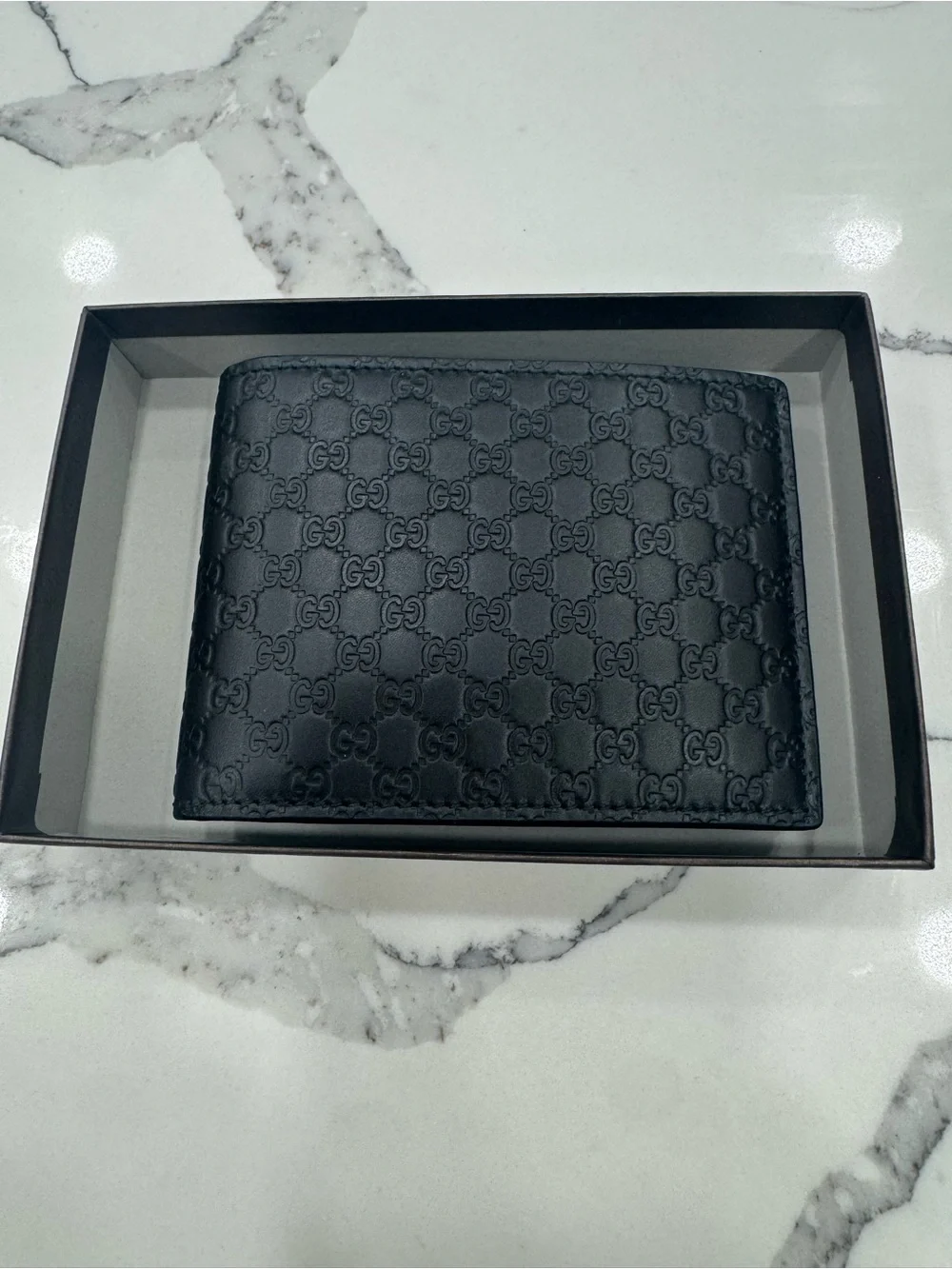 Gucci Black Embossed GG Leather Wallet